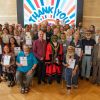 The winners of the community awards holding their certificates with Councillor Stephen Williams and the Lord Mayor stood in the centre of the winners
