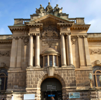 Photograph of the front of the Bristol Museum and Art Gallery Building- a lerge ornate stone building