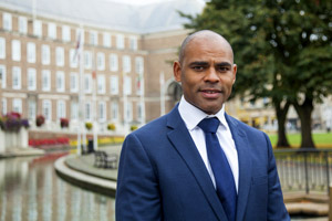 The mayor, Marvin Rees, with City Hall in the background