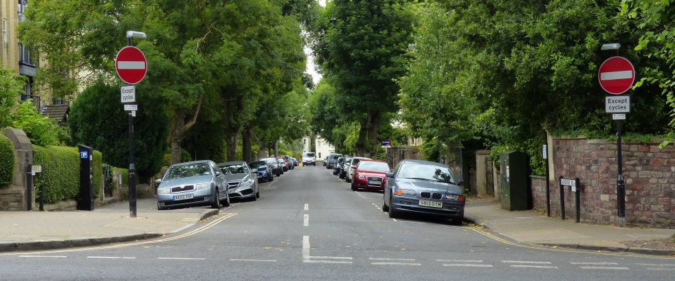 Illustrative image of a one-way street with two-way cycling permitted