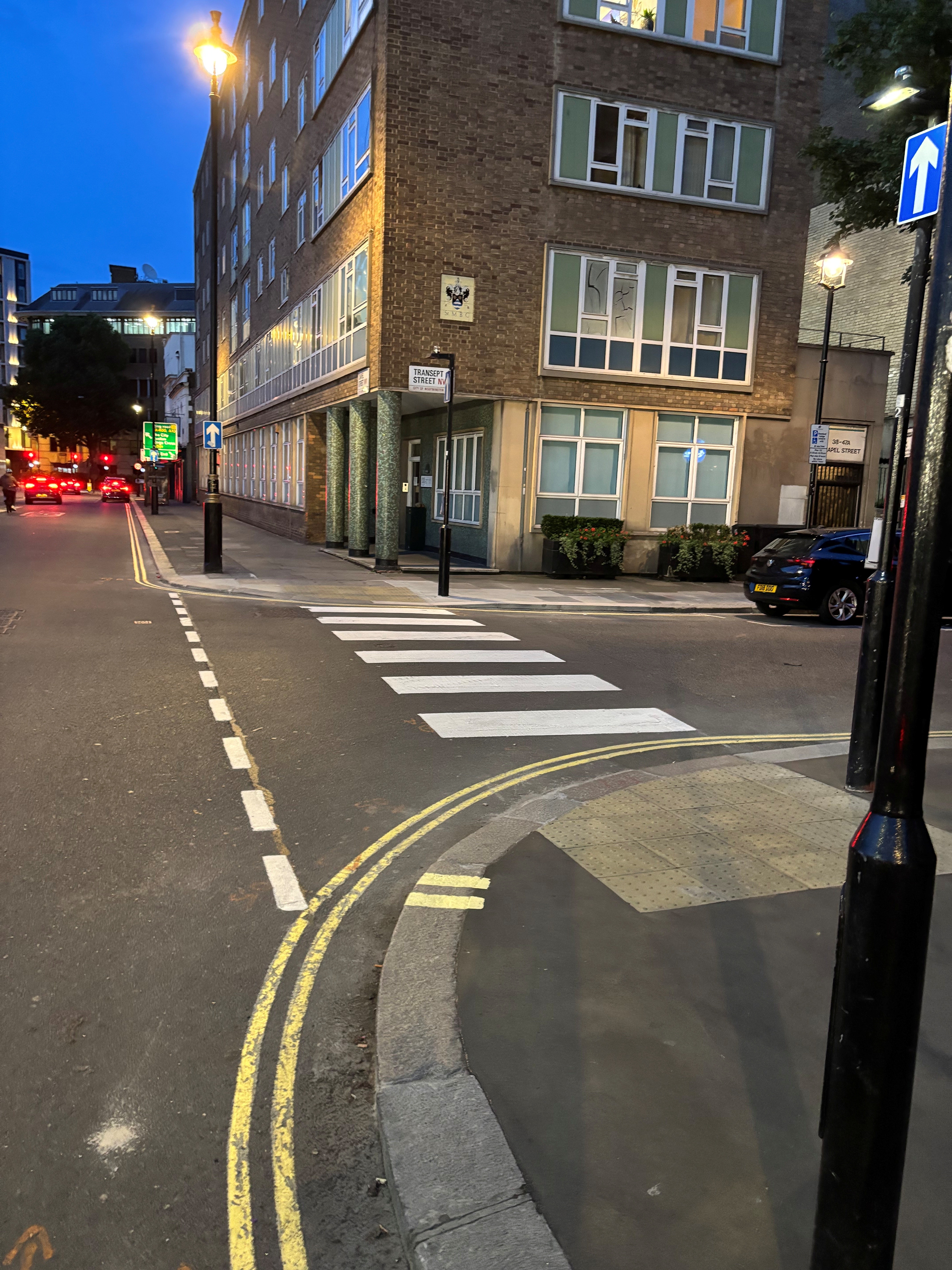 Illustrative image showing side-road junction improvement with zebra markings. This is fully described in the text above.