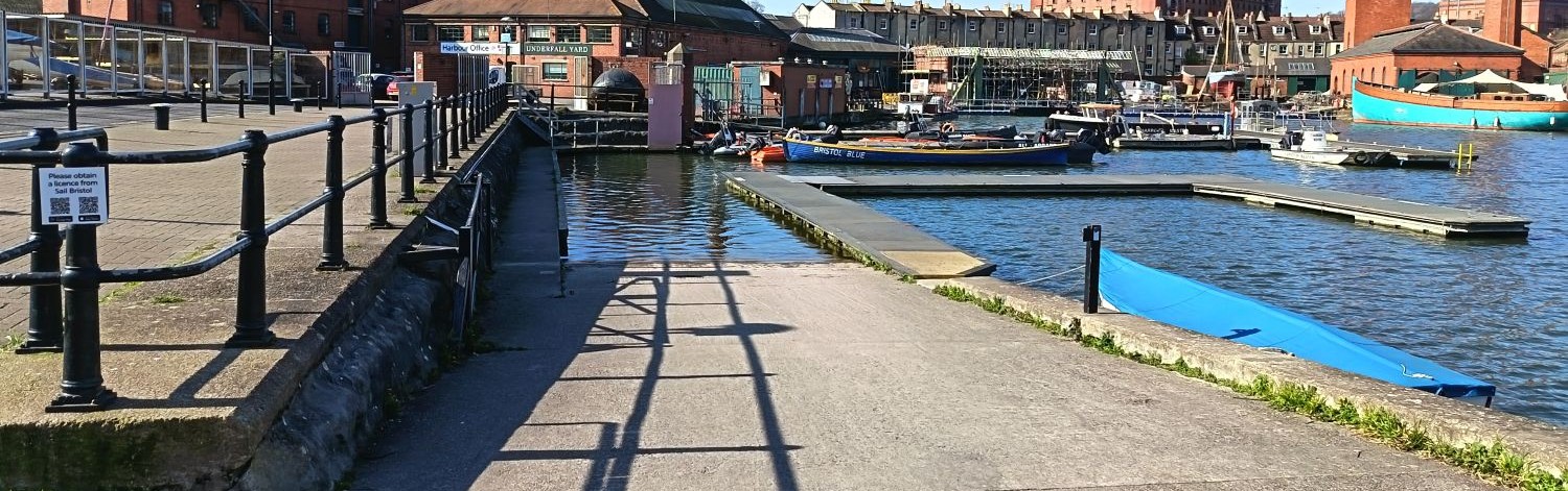 The slipway at Baltic Wharf, boats on the water, buildings in the background