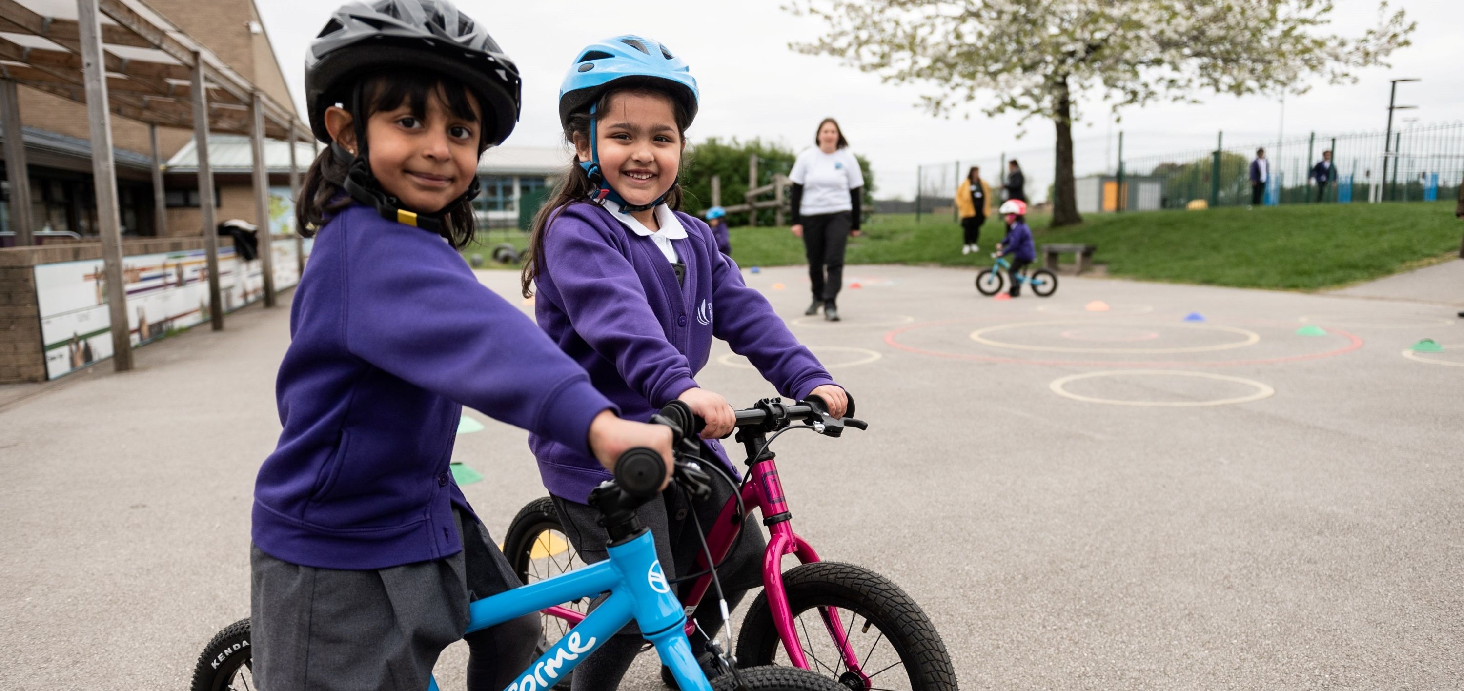 little girls on bike 3000x1200