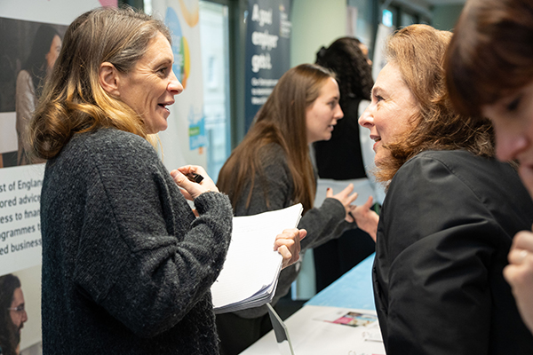 One woman talks to another at the 'Better Bristol' conference for business