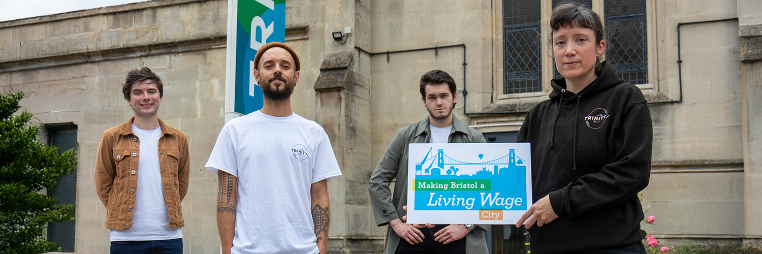 3 men and one woman stand outside the Trinity Centre in Bristol