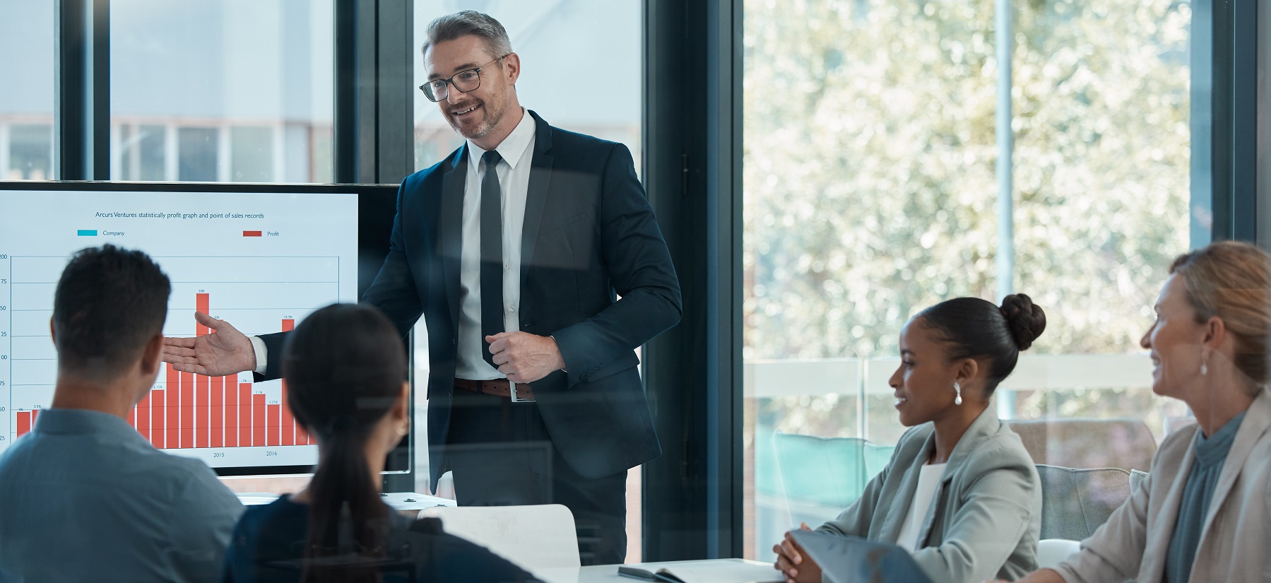 A group of people in a meeting.