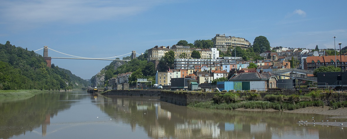 Bristol cityscape with Clifton Suspension Bridge in the background.