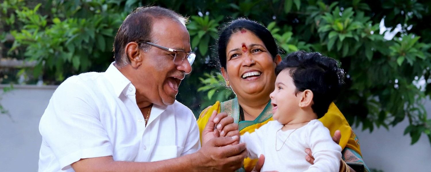 Couple and boy laughing