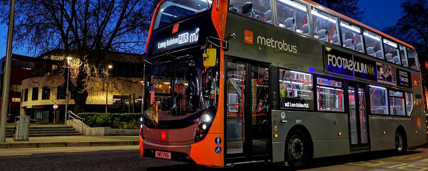 A metrobus in early evening